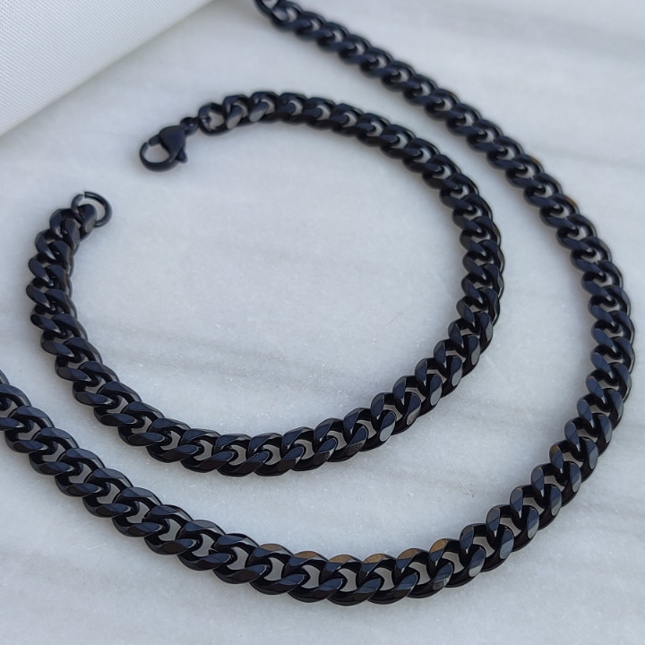 خرید ست گردنبند و دستبند مشکی مردانه رنگ ثابت