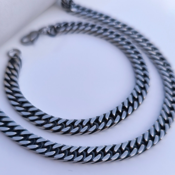 خرید زنجیر و دستبند مردانه نقره ای رنگ ثابت