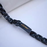 خرید دستبند کارتیر مشکی مردانه استیل رنگ ثابت