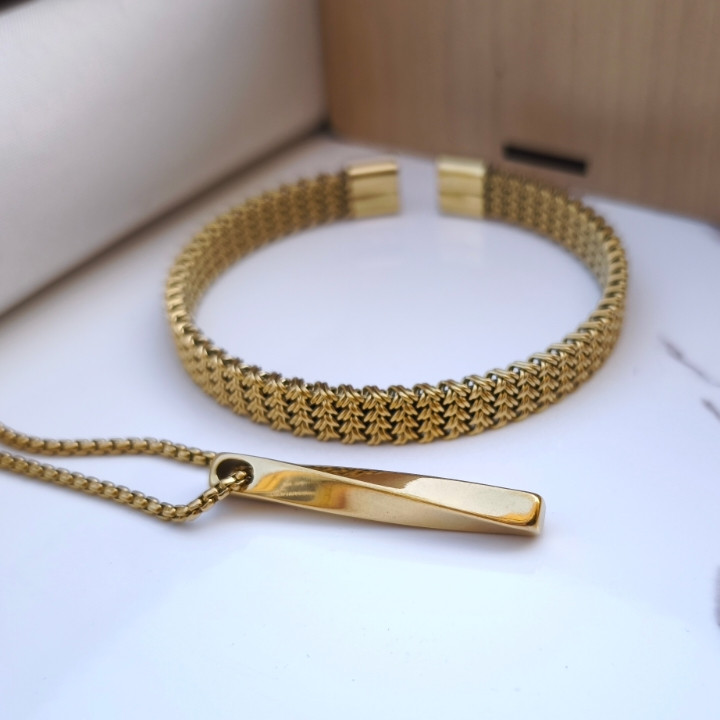 خرید ست گردنبند و دستبند پسرانه طلایی رنگ ثابت