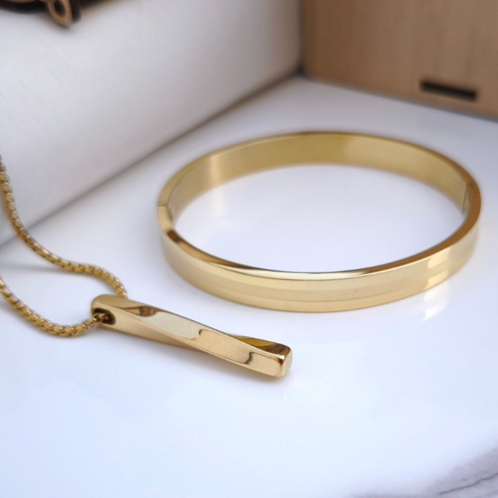 خرید ست گردنبند و دستبند طلایی مردانه استیل