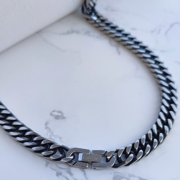 خرید زنجیر کارتیه مردانه سیاه قلم استیل رنگ ثابت