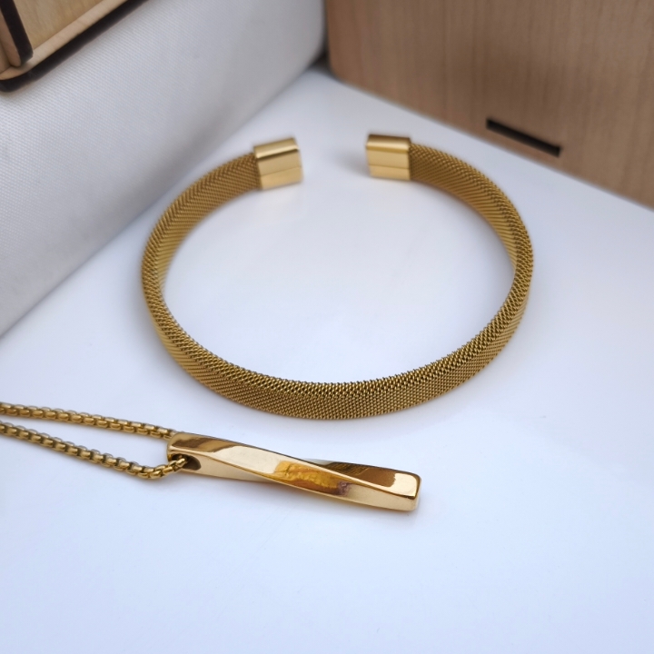 خرید ست گردنبند و دستبند پسرانه طلایی رنگ ثابت استیل