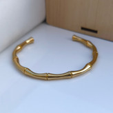 خرید بنگل طلایی پسرانه استیل رنگ ثابت طرح بامبو